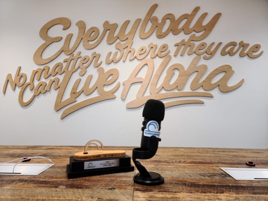 OluKai HQ – 2020 Flip Flop of The Year Award Presentation 2 Wall FFOTYAward Mic